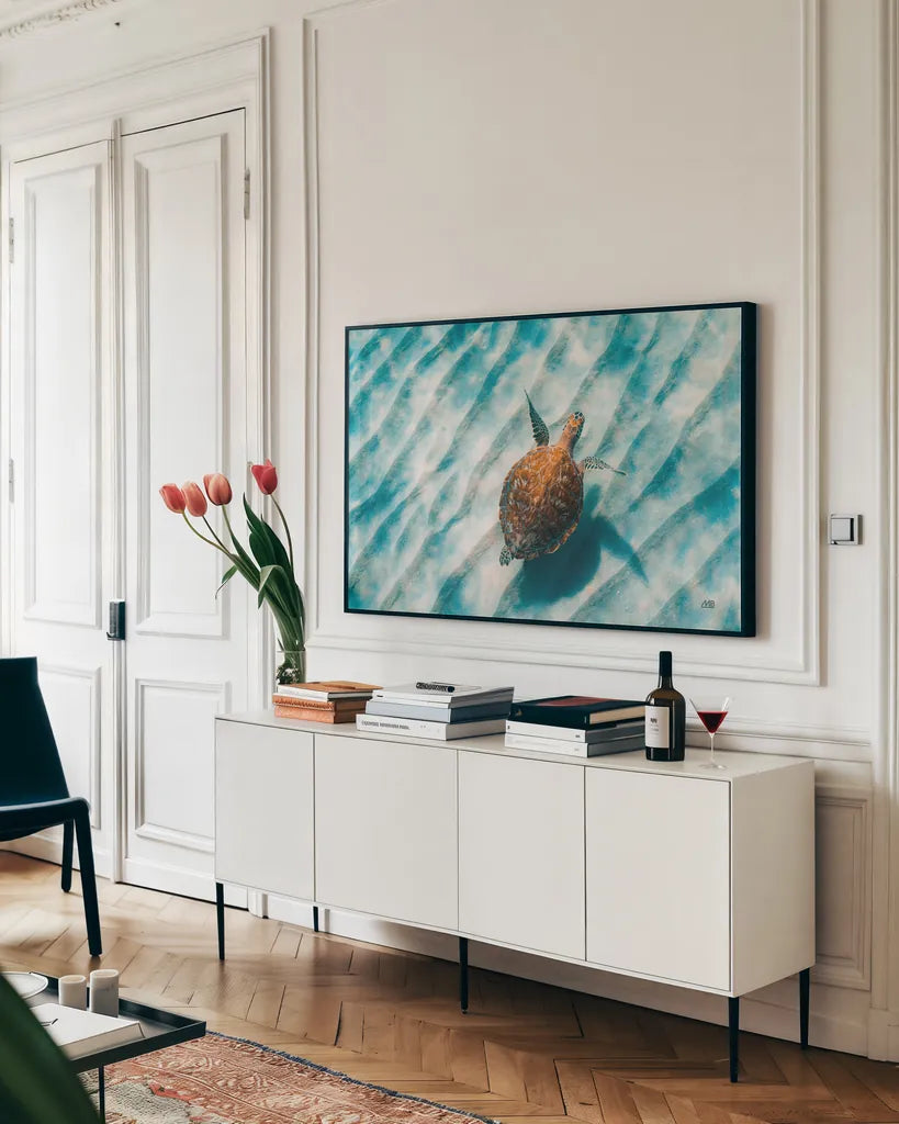 Sandbar Sea Turtle II by Max Blakesberg Studios. shown as a framed stretched canvas in a living room above a console. Available as a archival giclee rolled canvas, fine art paper, or poster print. SKU 91389i.