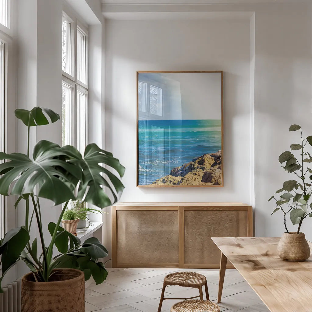 Serene Sea by Max Blakesberg Studios. shown as a print in a natural wood frame in a dining room. Available as a archival giclee rolled canvas, fine art paper, or poster print. SKU 93622h.