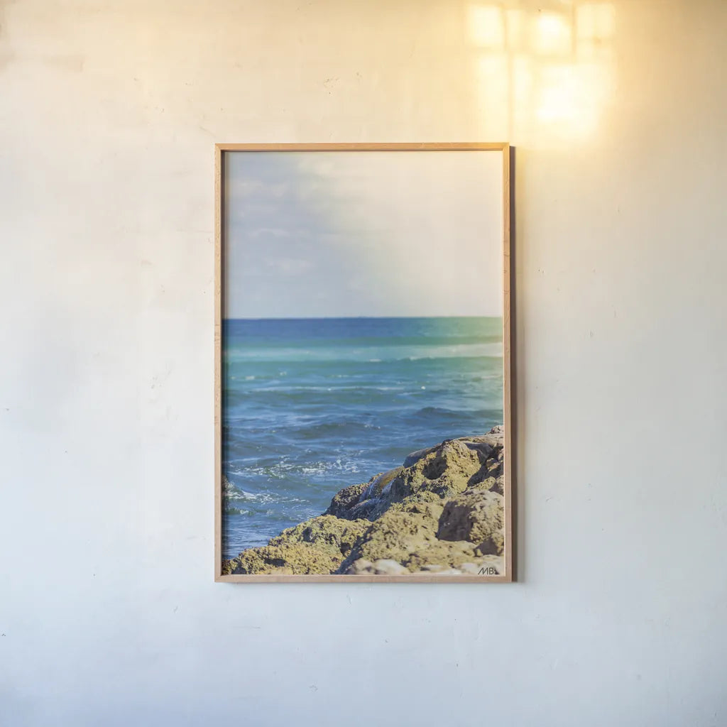 Serene Sea by Max Blakesberg Studios. shown as a paper print in a natural frame. Available as a archival giclee rolled canvas, fine art paper, or poster print. SKU 93622h.