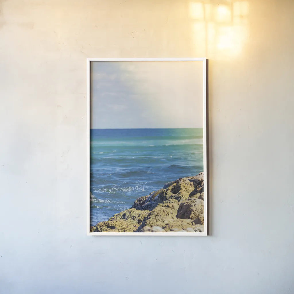 Serene Sea by Max Blakesberg Studios. shown as a paper print in a white frame. Available as a archival giclee rolled canvas, fine art paper, or poster print. SKU 93622h.
