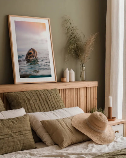 Sunrise Swim by Max Blakesberg Studios. shown as a paper print in a natural frame. Available as a archival giclee rolled canvas, fine art paper, or poster print. SKU 91647h.