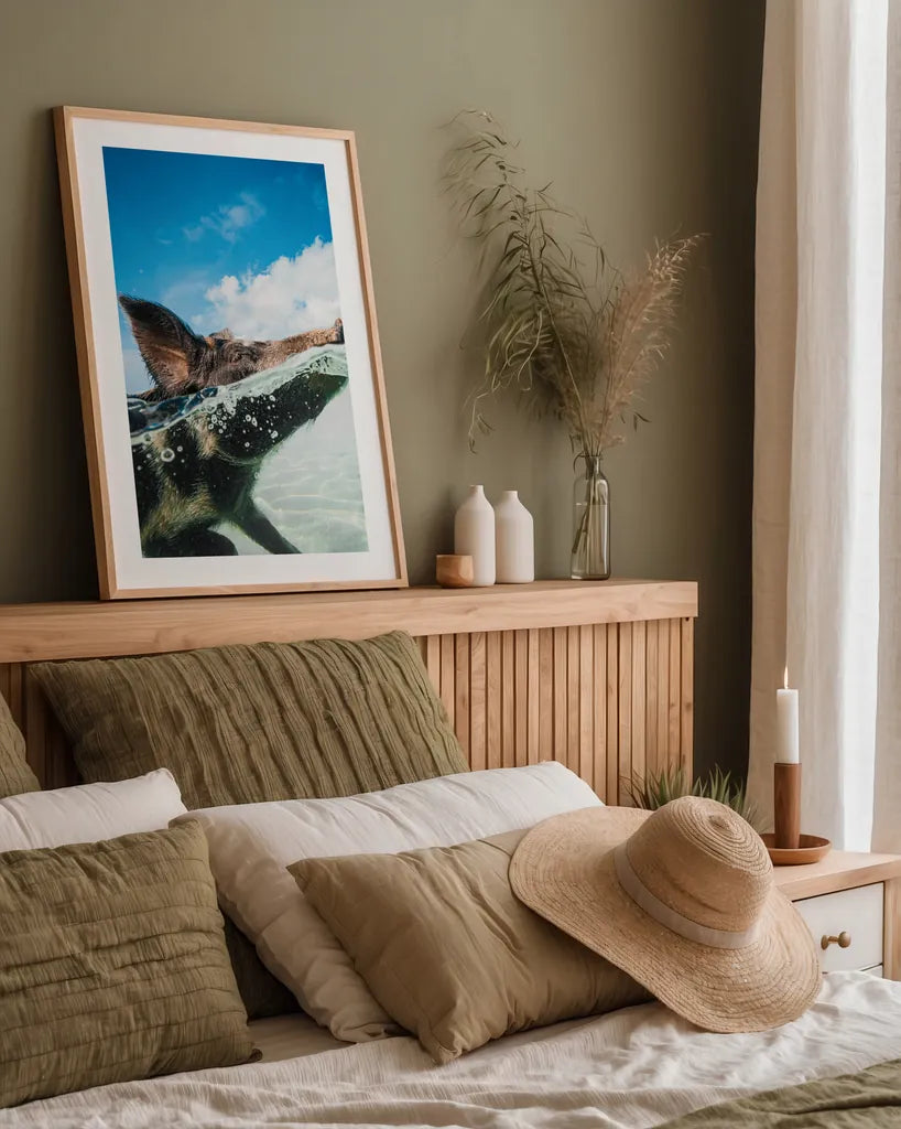 Swimming Pig by Max Blakesberg Studios. shown as a paper print in a natural frame. Available as a archival giclee rolled canvas, fine art paper, or poster print. SKU 92807h.