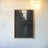 Venice Canal by Max Blakesberg Studios. shown as a paper print in a natural frame. Available as a archival giclee rolled canvas, fine art paper, or poster print. SKU 91648h.