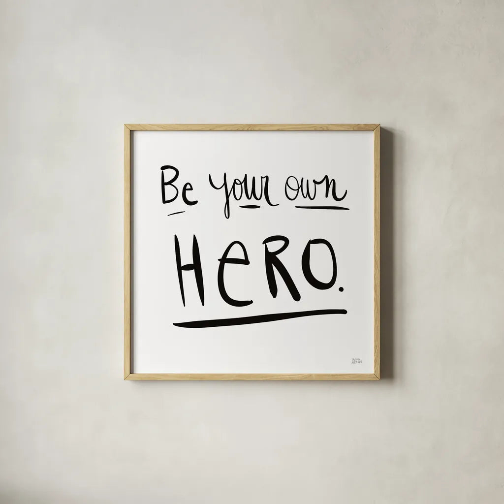 Be Your Own Hero by Melissa Averinos. Shown in a natural wood glass frame for a timeless modern aesthetic. Available as an archival giclee rolled canvas, fine art paper, or poster print. SKU 64426a.
