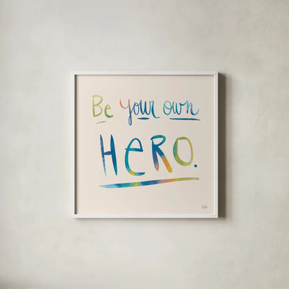 Be Your Own Hero Colorful by Melissa Averinos. Shown in a crisp white glass frame for a clean and minimalist style. Available as an archival giclee rolled canvas, fine art paper, or poster print. SKU 77929a.