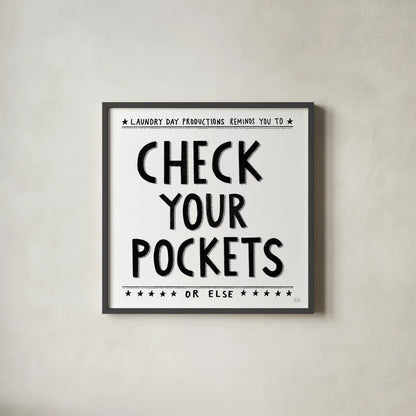 Check Your Pockets by Melissa Averinos. Shown in a sleek black glass frame for a contemporary gallery look. Available as an archival giclee rolled canvas, fine art paper, or poster print. SKU 59179a.