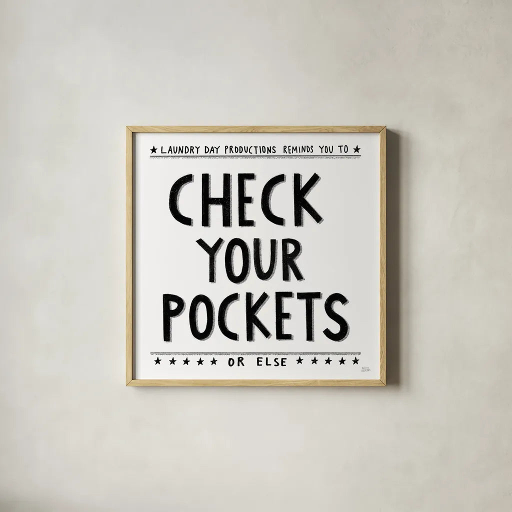Check Your Pockets by Melissa Averinos. Shown in a natural wood glass frame for a timeless modern aesthetic. Available as an archival giclee rolled canvas, fine art paper, or poster print. SKU 59179a.