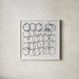 Circle Element 2 by Melissa Averinos. Shown in a crisp white glass frame for a clean and minimalist style. Available as an archival giclee rolled canvas, fine art paper, or poster print. SKU 28959a.