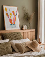Collage Cactus IV by Melissa Averinos. shown as a paper print in a natural frame. Available as a archival giclee rolled canvas, fine art paper, or poster print. SKU 23878h.