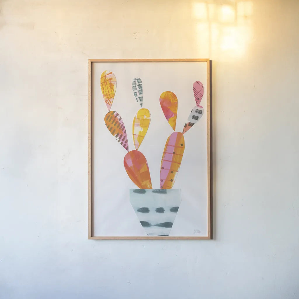 Collage Cactus IV by Melissa Averinos. shown as a paper print in a natural frame. Available as a archival giclee rolled canvas, fine art paper, or poster print. SKU 23878h.