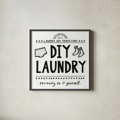 DIY Laundry by Melissa Averinos. Shown in a sleek black glass frame for a contemporary gallery look. Available as an archival giclee rolled canvas, fine art paper, or poster print. SKU 59178a.