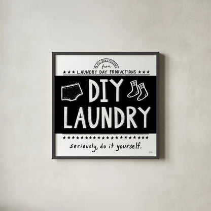 DIY Laundry BW by Melissa Averinos. Shown in a sleek black glass frame for a contemporary gallery look. Available as an archival giclee rolled canvas, fine art paper, or poster print. SKU 59466a.
