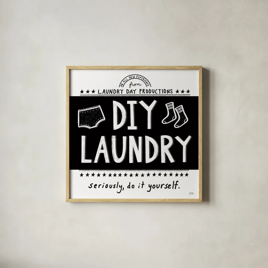 DIY Laundry BW by Melissa Averinos. Shown in a natural wood glass frame for a timeless modern aesthetic. Available as an archival giclee rolled canvas, fine art paper, or poster print. SKU 59466a.