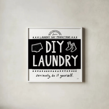 DIY Laundry BW by Melissa Averinos. Shown in a crisp white glass frame for a clean and minimalist style. Available as an archival giclee rolled canvas, fine art paper, or poster print. SKU 59466a.