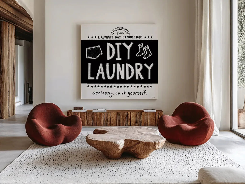 DIY Laundry BW by Melissa Averinos. Shown as extra-large giant wall art in a modern living room. Available as an archival giclee rolled canvas, fine art paper, or poster print. SKU 59466a.