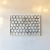 Eclipse I Neutral by Melissa Averinos. shown as a paper print in a white frame. Available as a archival giclee rolled canvas, fine art paper, or poster print. SKU 29242i.