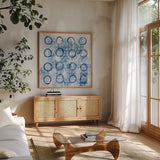 Eclipse III by Melissa Averinos. Shown in a natural wood frame in a cozy modern living room. Available as an archival giclee rolled canvas, fine art paper, or poster print. SKU 29239a.
