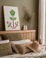 Flower Power I by Melissa Averinos. shown as a paper print in a natural frame. Available as a archival giclee rolled canvas, fine art paper, or poster print. SKU 34028h.