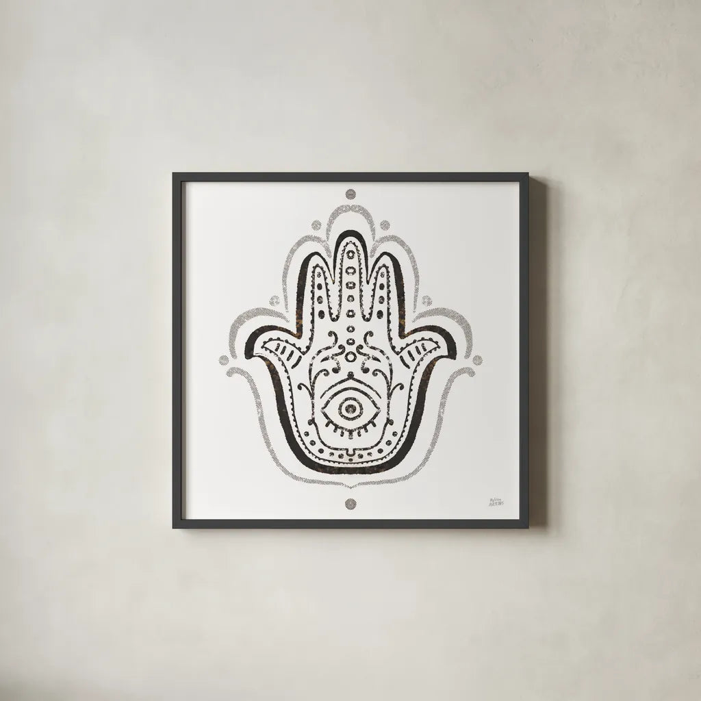 Hamsa Amulet in Black by Melissa Averinos. Shown in a sleek black glass frame for a contemporary gallery look. Available as an archival giclee rolled canvas, fine art paper, or poster print. SKU 64429a.