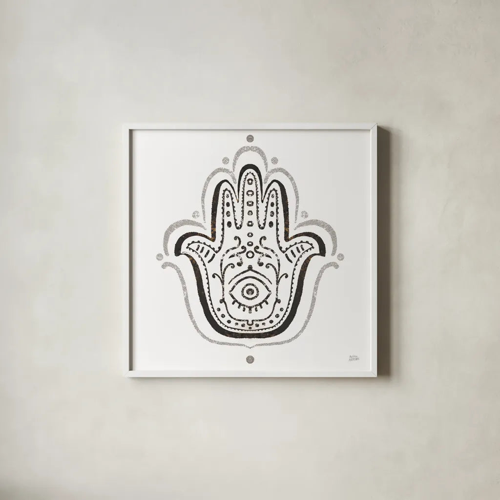 Hamsa Amulet in Black by Melissa Averinos. Shown in a crisp white glass frame for a clean and minimalist style. Available as an archival giclee rolled canvas, fine art paper, or poster print. SKU 64429a.