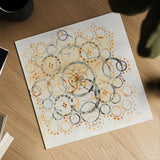 Henna Mandala II by Melissa Averinos. Shown as a detailed flat fine art print, highlighting archival giclee quality. Available as an archival giclee rolled canvas, fine art paper, or poster print. SKU 29112a.