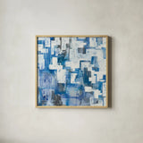 In Blue A Maze by Melissa Averinos. Shown in a natural wood glass frame for a timeless modern aesthetic. Available as an archival giclee rolled canvas, fine art paper, or poster print. SKU 27613a.