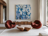 In Blue A Maze by Melissa Averinos. Shown as extra-large giant wall art in a modern living room. Available as an archival giclee rolled canvas, fine art paper, or poster print. SKU 27613a.
