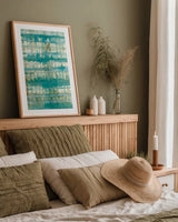 Kanari I by Melissa Averinos. shown as a paper print in a natural frame. Available as a archival giclee rolled canvas, fine art paper, or poster print. SKU 42874h.