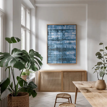 Kanari I Indigo by Melissa Averinos. shown as a print in a natural wood frame in a dining room. Available as a archival giclee rolled canvas, fine art paper, or poster print. SKU 43113h.