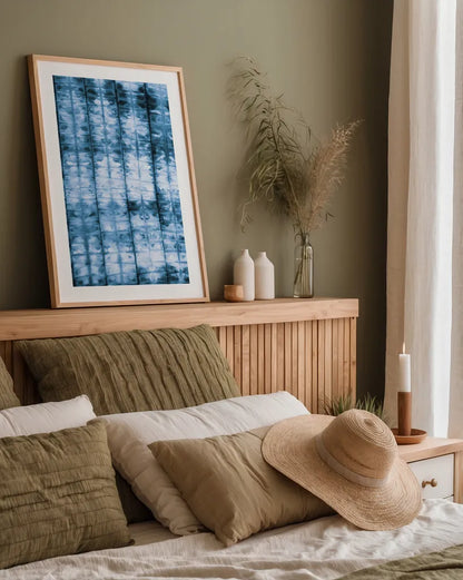 Kanari II Indigo by Melissa Averinos. shown as a paper print in a natural frame. Available as a archival giclee rolled canvas, fine art paper, or poster print. SKU 43114h.