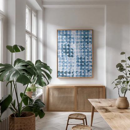 Kanari III Indigo by Melissa Averinos. shown as a print in a natural wood frame in a dining room. Available as a archival giclee rolled canvas, fine art paper, or poster print. SKU 43115h.