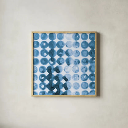 Kanari Square I Indigo by Melissa Averinos. Shown in a natural wood glass frame for a timeless modern aesthetic. Available as an archival giclee rolled canvas, fine art paper, or poster print. SKU 43111a.