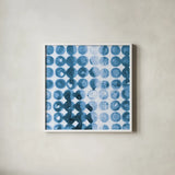Kanari Square I Indigo by Melissa Averinos. Shown in a crisp white glass frame for a clean and minimalist style. Available as an archival giclee rolled canvas, fine art paper, or poster print. SKU 43111a.