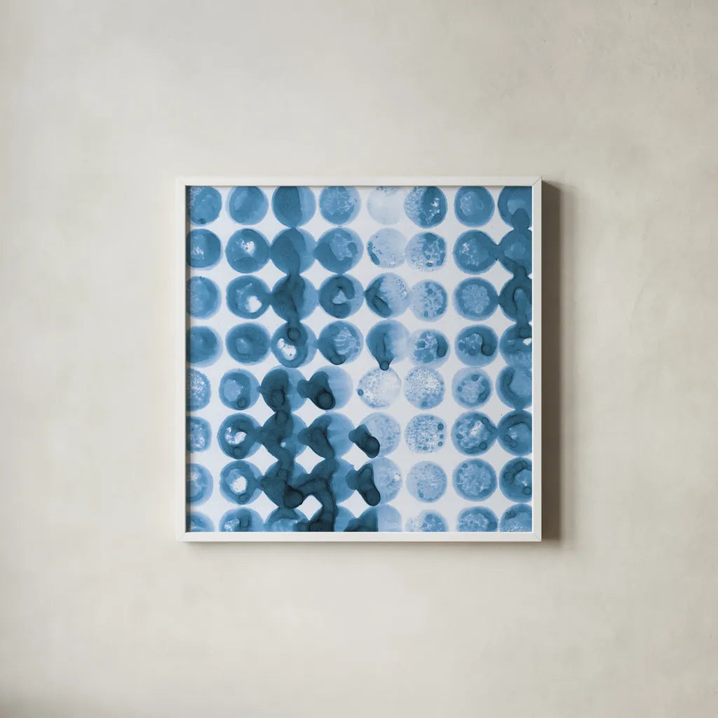 Kanari Square I Indigo by Melissa Averinos. Shown in a crisp white glass frame for a clean and minimalist style. Available as an archival giclee rolled canvas, fine art paper, or poster print. SKU 43111a.