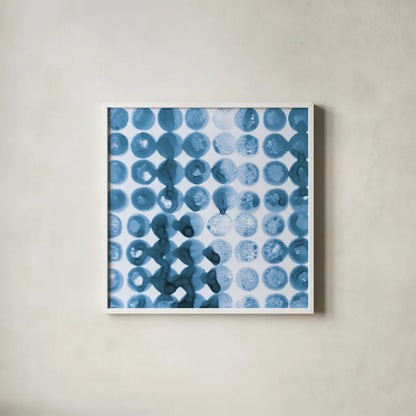 Kanari Square I Indigo by Melissa Averinos. Shown in a crisp white glass frame for a clean and minimalist style. Available as an archival giclee rolled canvas, fine art paper, or poster print. SKU 43111a.