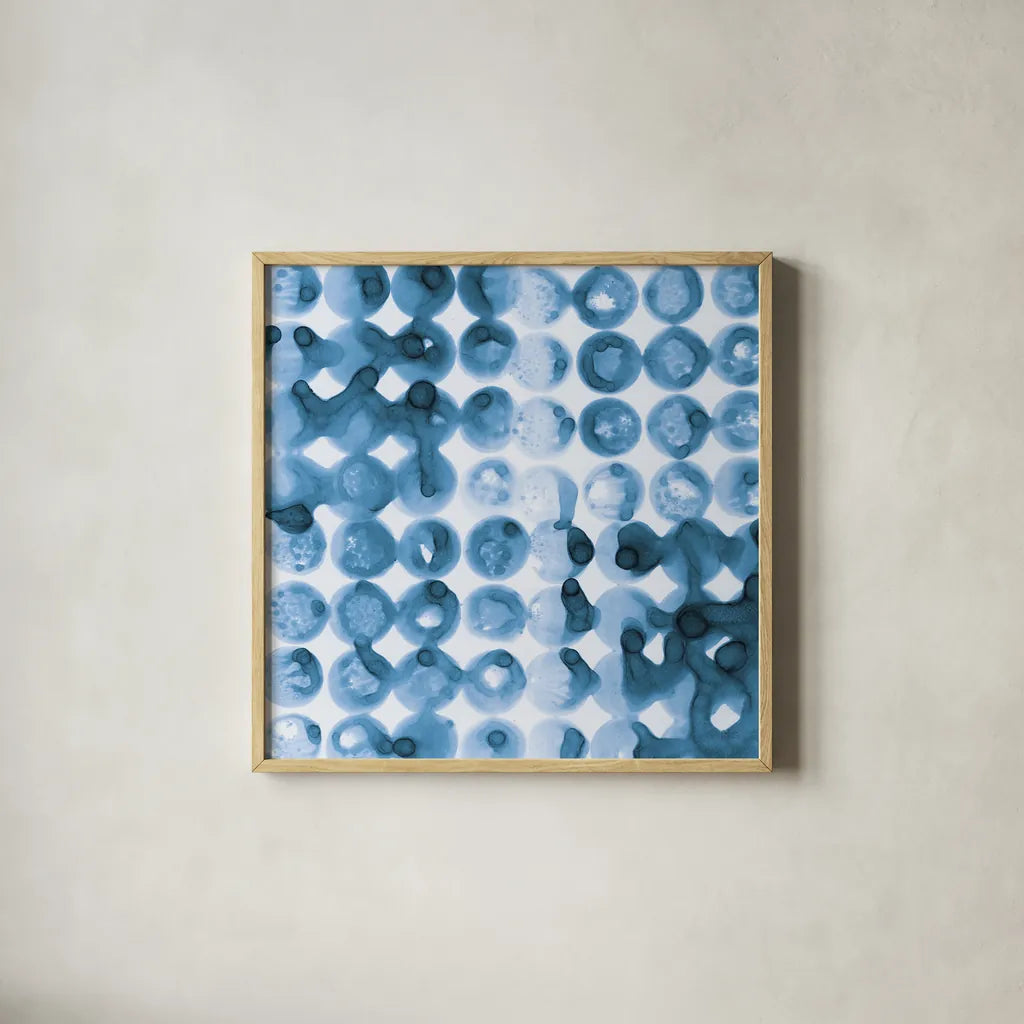 Kanari Square II Indigo by Melissa Averinos. Shown in a natural wood glass frame for a timeless modern aesthetic. Available as an archival giclee rolled canvas, fine art paper, or poster print. SKU 43112a.