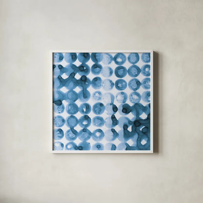Kanari Square II Indigo by Melissa Averinos. Shown in a crisp white glass frame for a clean and minimalist style. Available as an archival giclee rolled canvas, fine art paper, or poster print. SKU 43112a.