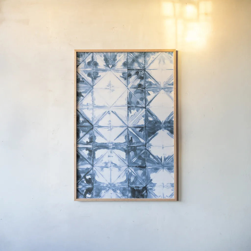 Kanari VI Indigo by Melissa Averinos. shown as a paper print in a natural frame. Available as a archival giclee rolled canvas, fine art paper, or poster print. SKU 43118h.