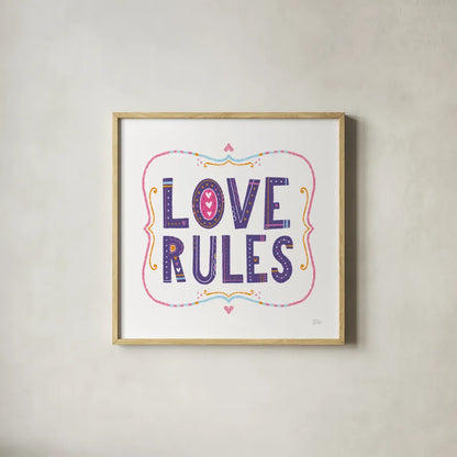 Love Rules by Melissa Averinos. Shown in a natural wood glass frame for a timeless modern aesthetic. Available as an archival giclee rolled canvas, fine art paper, or poster print. SKU 59982a.