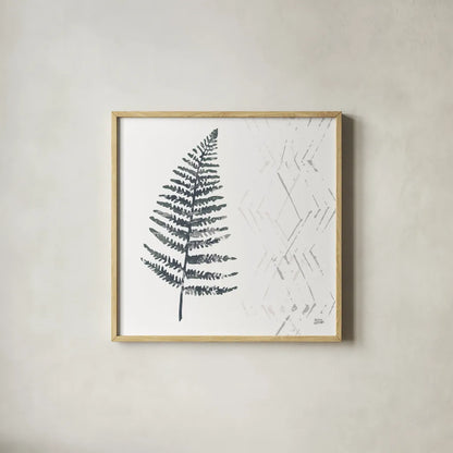 Nordic Fern I by Melissa Averinos. Shown in a natural wood glass frame for a timeless modern aesthetic. Available as an archival giclee rolled canvas, fine art paper, or poster print. SKU 57294a.