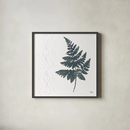 Nordic Fern II by Melissa Averinos. Shown in a sleek black glass frame for a contemporary gallery look. Available as an archival giclee rolled canvas, fine art paper, or poster print. SKU 57295a.