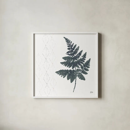 Nordic Fern II by Melissa Averinos. Shown in a crisp white glass frame for a clean and minimalist style. Available as an archival giclee rolled canvas, fine art paper, or poster print. SKU 57295a.