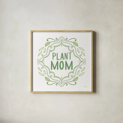 Plant Love I by Melissa Averinos. Shown in a natural wood glass frame for a timeless modern aesthetic. Available as an archival giclee rolled canvas, fine art paper, or poster print. SKU 59969a.