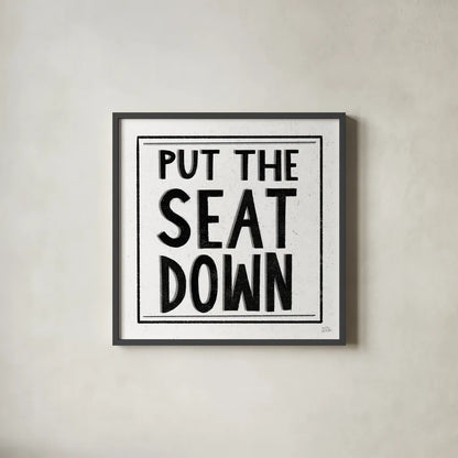 Put the Seat Down by Melissa Averinos. Shown in a sleek black glass frame for a contemporary gallery look. Available as an archival giclee rolled canvas, fine art paper, or poster print. SKU 59180a.