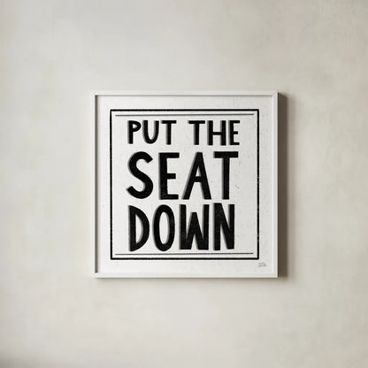 Put the Seat Down by Melissa Averinos. Shown in a crisp white glass frame for a clean and minimalist style. Available as an archival giclee rolled canvas, fine art paper, or poster print. SKU 59180a.