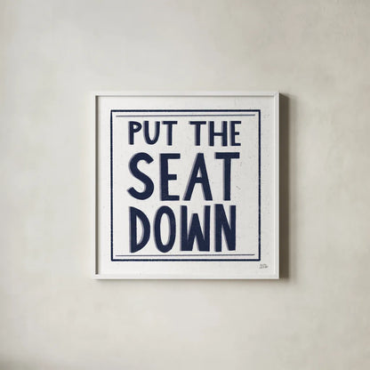 Put the Seat Down Navy by Melissa Averinos. Shown in a crisp white glass frame for a clean and minimalist style. Available as an archival giclee rolled canvas, fine art paper, or poster print. SKU 59464a.