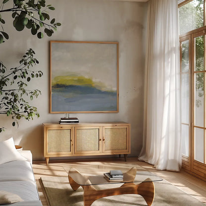 River Town by Melissa Averinos. Shown in a natural wood frame in a cozy modern living room. Available as an archival giclee rolled canvas, fine art paper, or poster print. SKU 64354a.