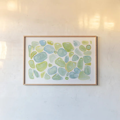Seaglass Abstract by Melissa Averinos. shown as a paper print in a natural frame. Available as a archival giclee rolled canvas, fine art paper, or poster print. SKU 47192i.