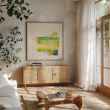 Stacks I by Melissa Averinos. Shown in a natural wood frame in a cozy modern living room. Available as an archival giclee rolled canvas, fine art paper, or poster print. SKU 36901a.
