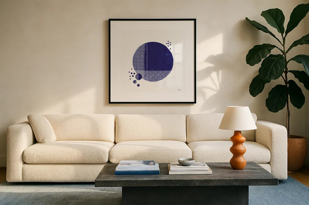 Tribeca I Indigo by Melissa Averinos. Displayed in a glass frame with matte in a clean modern living room. Available as an archival giclee rolled canvas, fine art paper, or poster print. SKU 80571a.